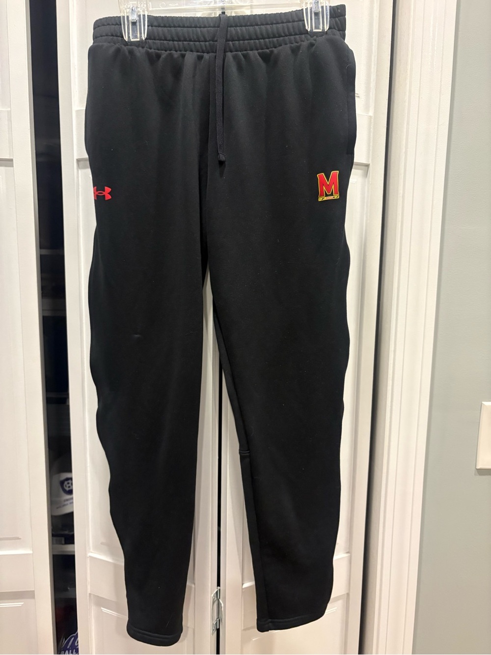 Under Armour Black Joggers with Red and Yellow 'M' Patch